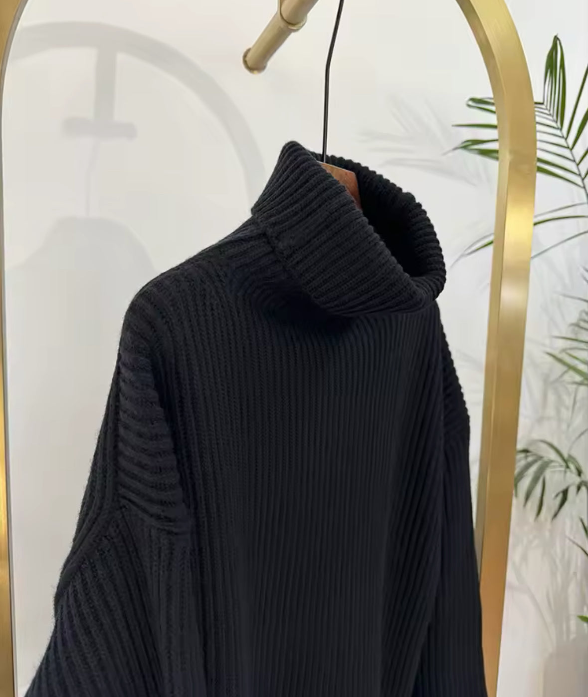 Le pull à col roulé