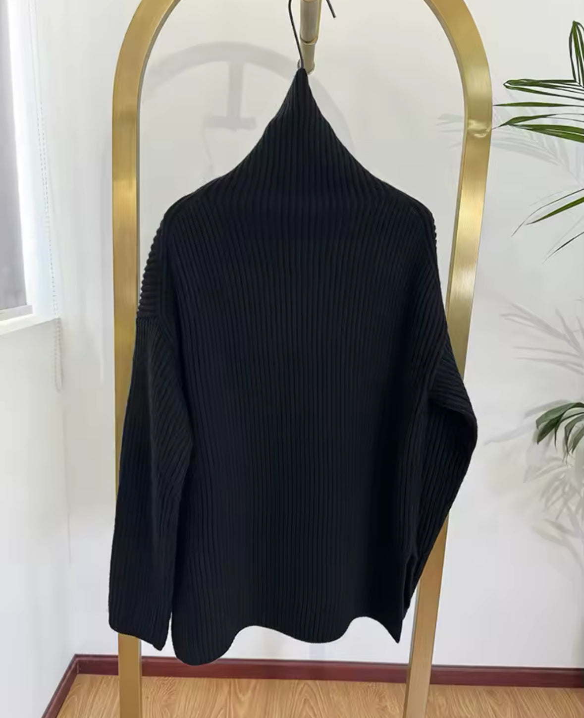 Le pull à col roulé