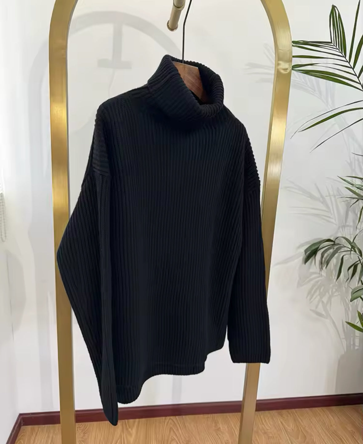 Le pull à col roulé