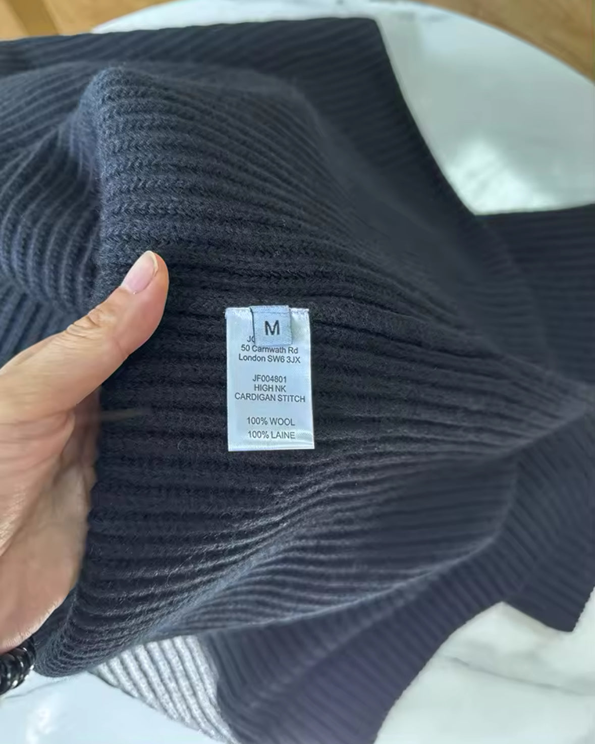 Le pull à col roulé