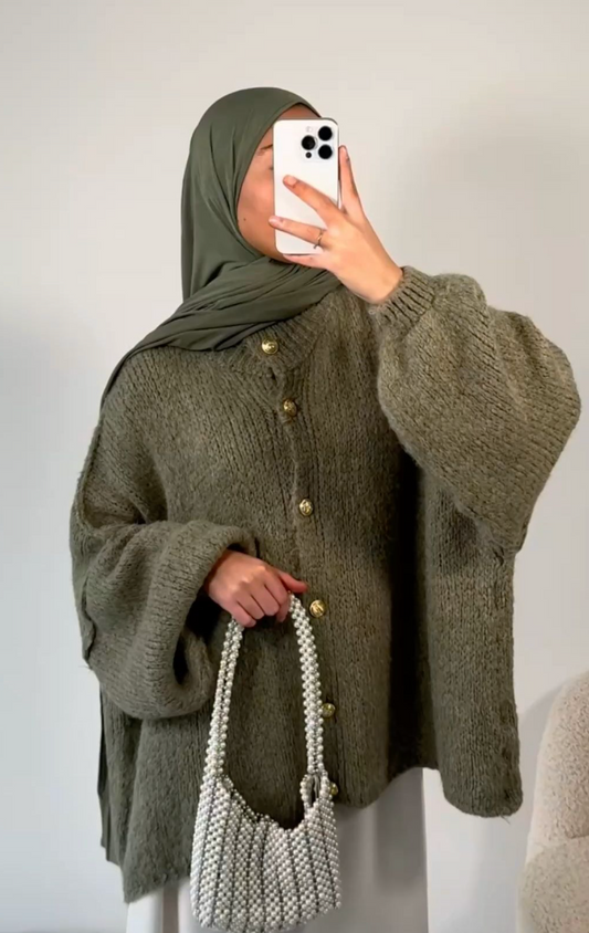 La gilet boutonnée de coton